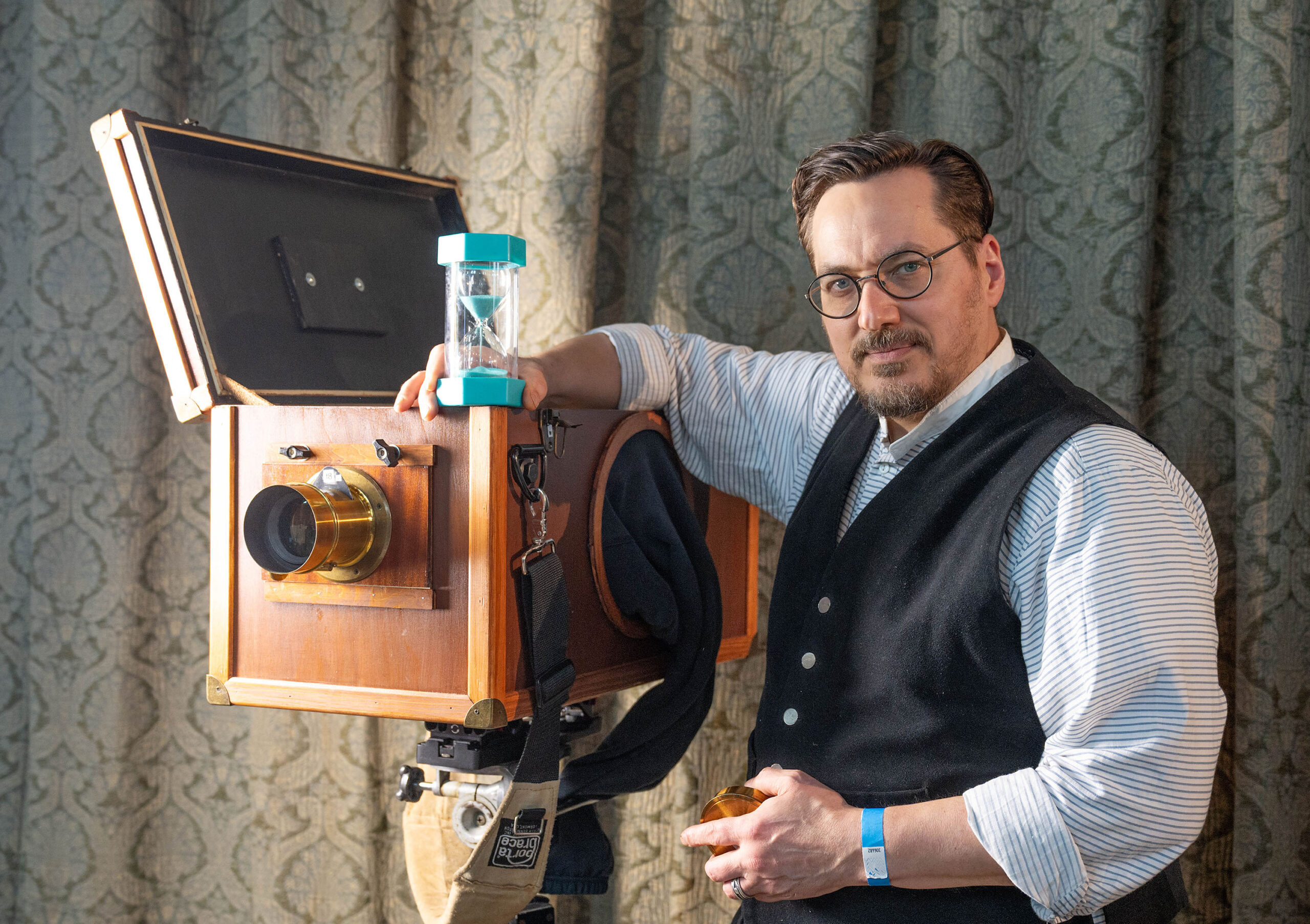A guy with an old camera