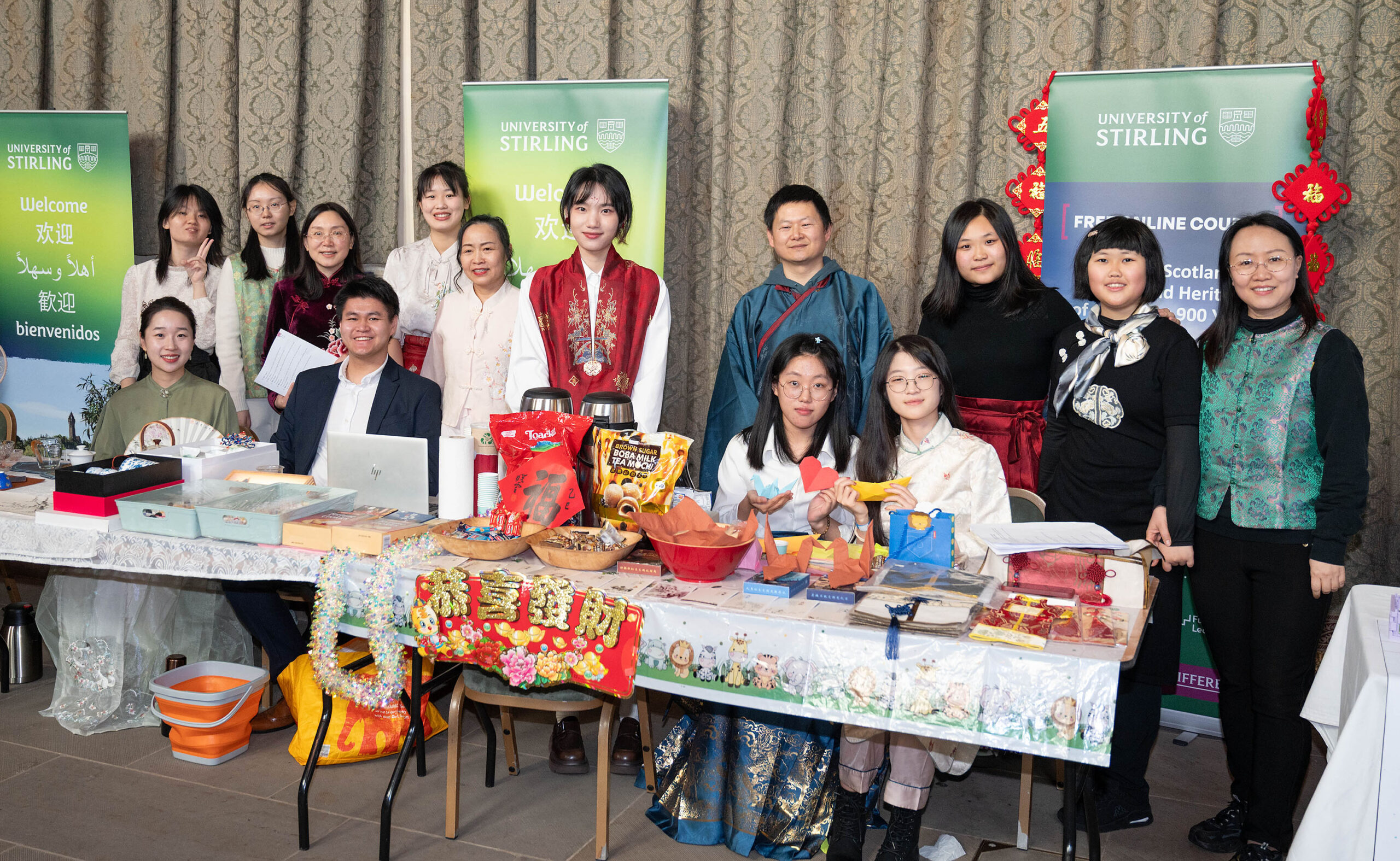 A group of people from the University of Stirling at their information stall
