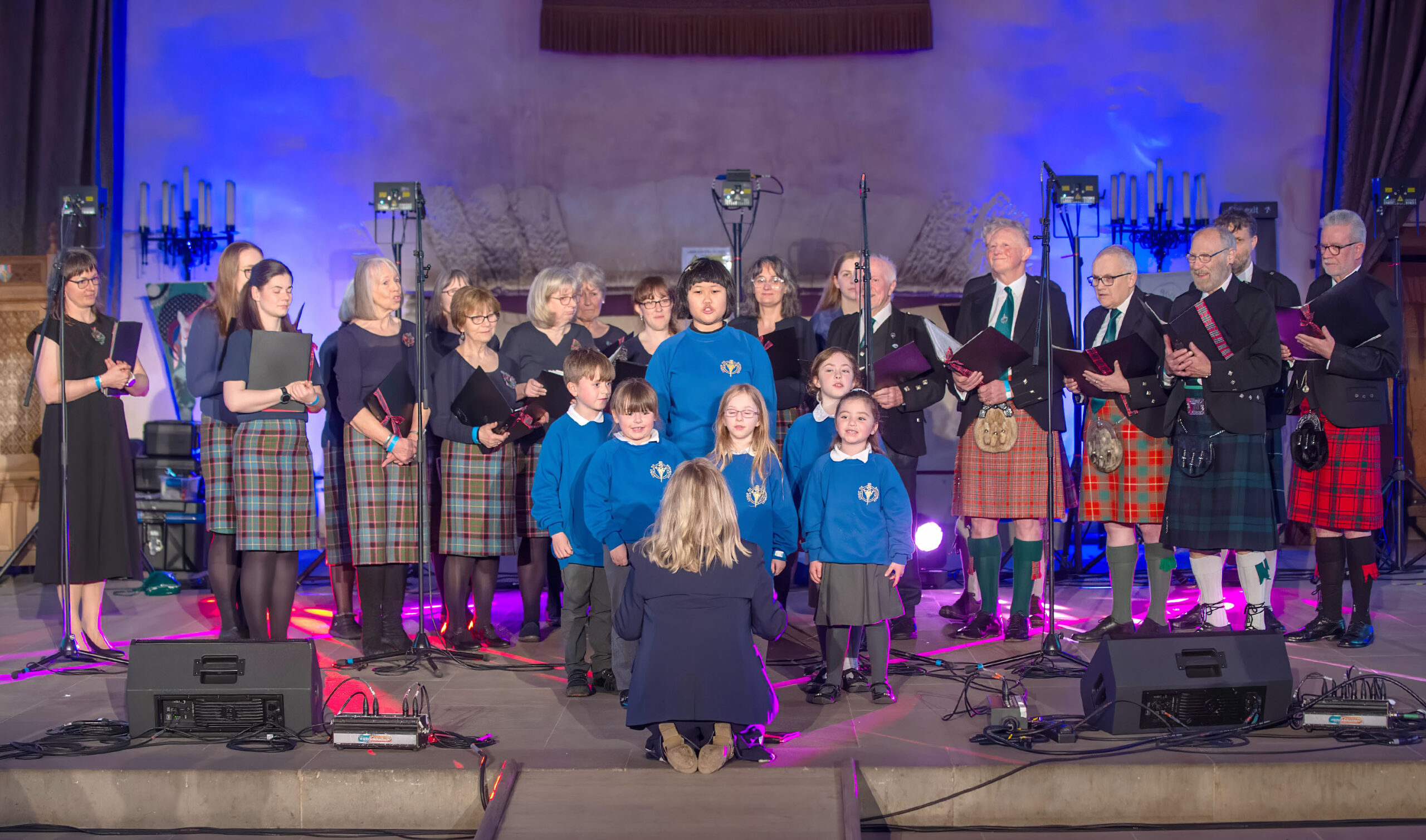 A choir singing in a hall